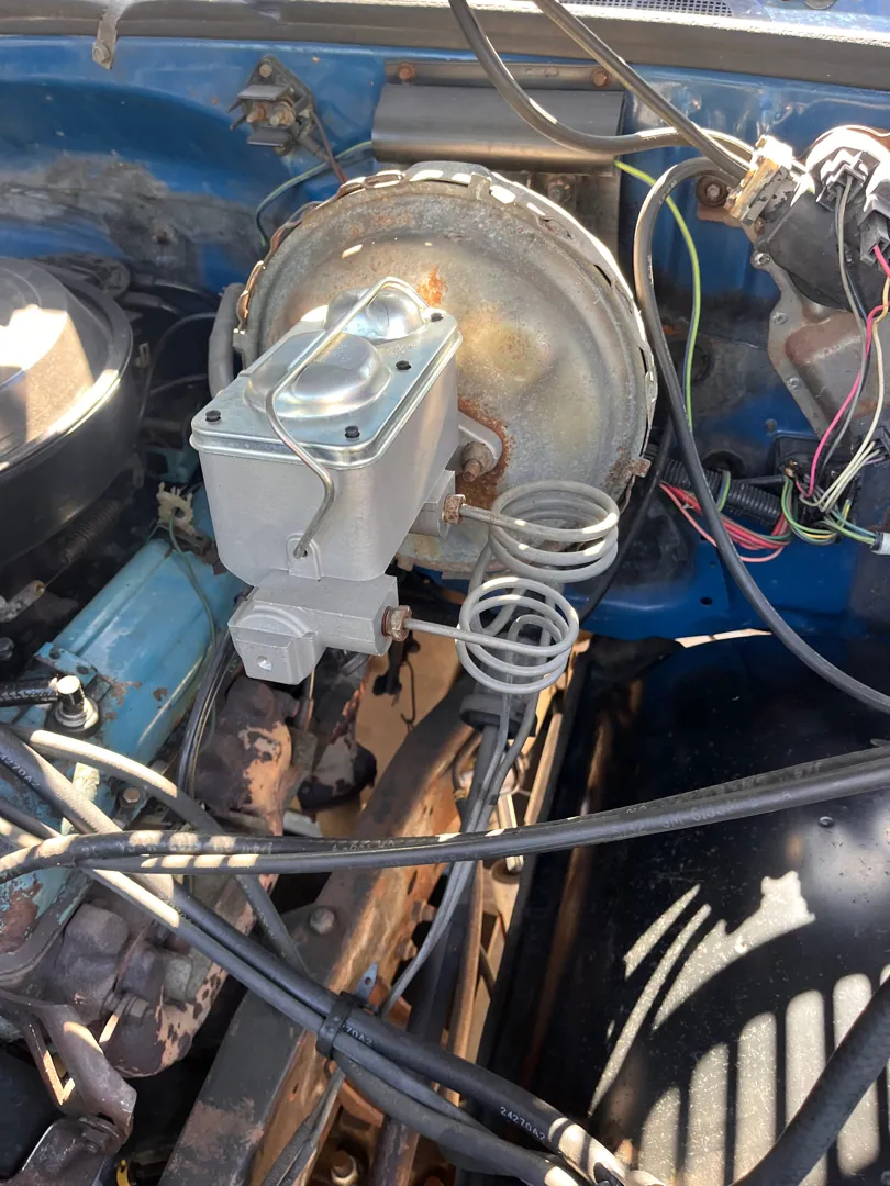 Brake booster and master cylinder at the firewall on an older truck inspection — Riverside, CA