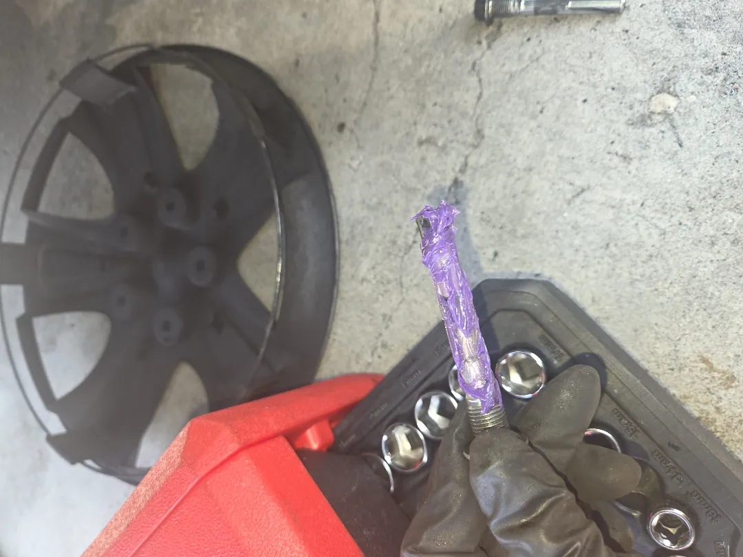 Wheel off and socket set open on a front brake job — Riverside, CA