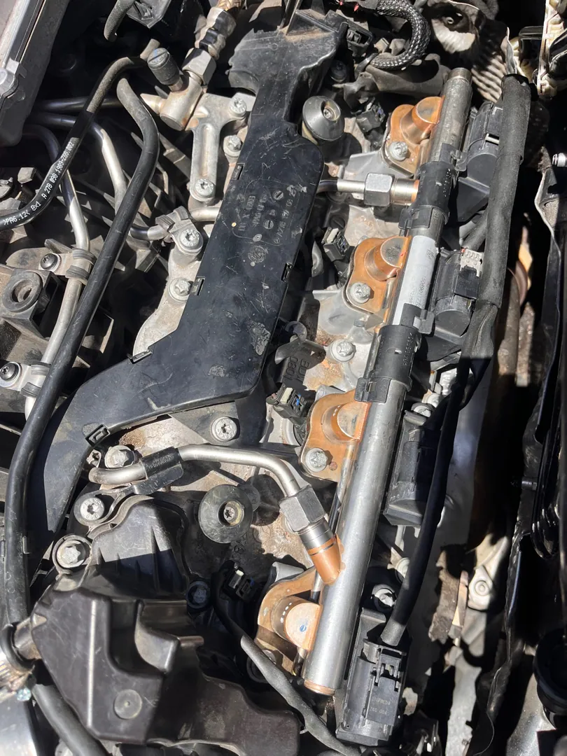 Fuel rail and injectors exposed on a Corona job, cylinder 7 was the one misbehaving in Corona, CA