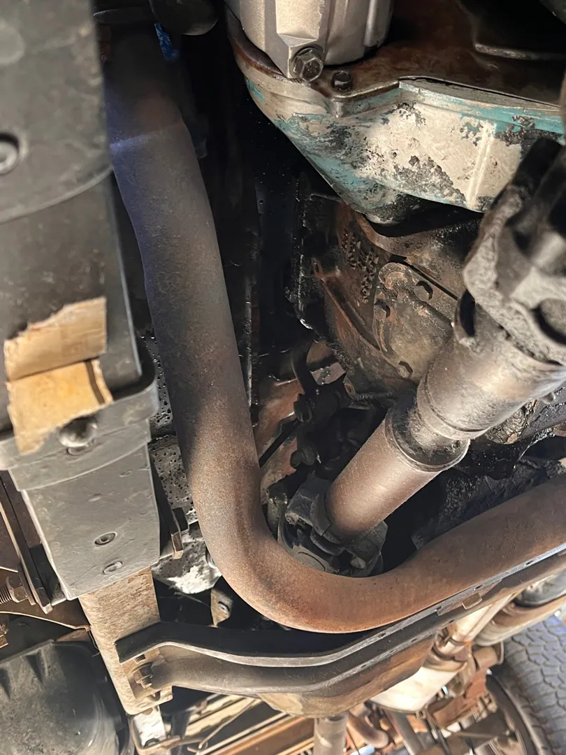 Exhaust and suspension checked from underneath on a pre-purchase inspection in Riverside, CA