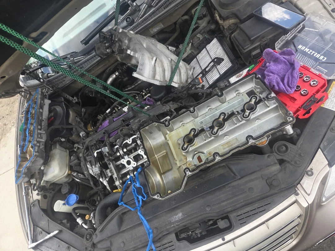 Valve cover gasket job in Corona, cover lifted and sealing face exposed in Corona, CA